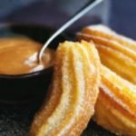 Churros with coconut sauce